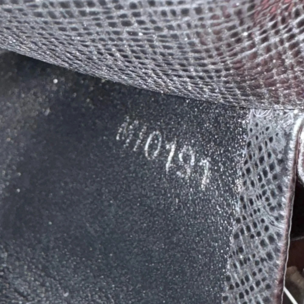 Louis Vuitton Damier Graphite Canvas
Double Snap Wallet - Picture 9 of 9